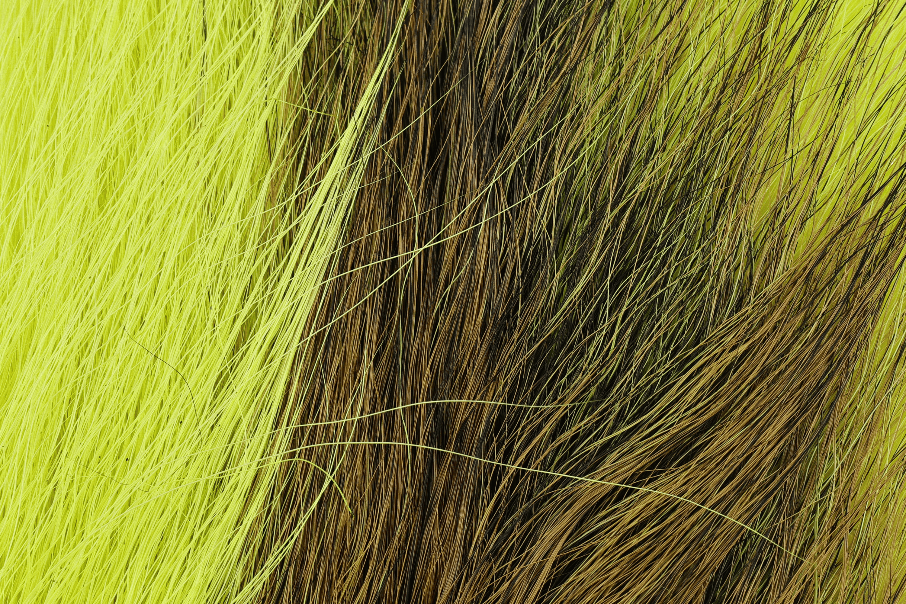 Hareline large Northern bucktail with bright chartreuse and natural brown long hairs for fly tying