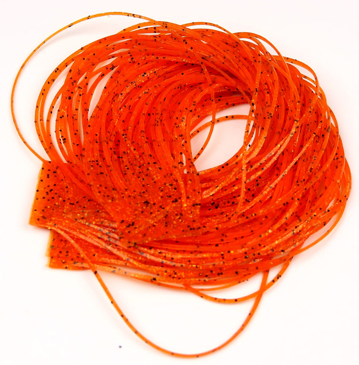 Bright translucent orange rubber Loco Legs with black speckles, thin coiled strands for fly tying