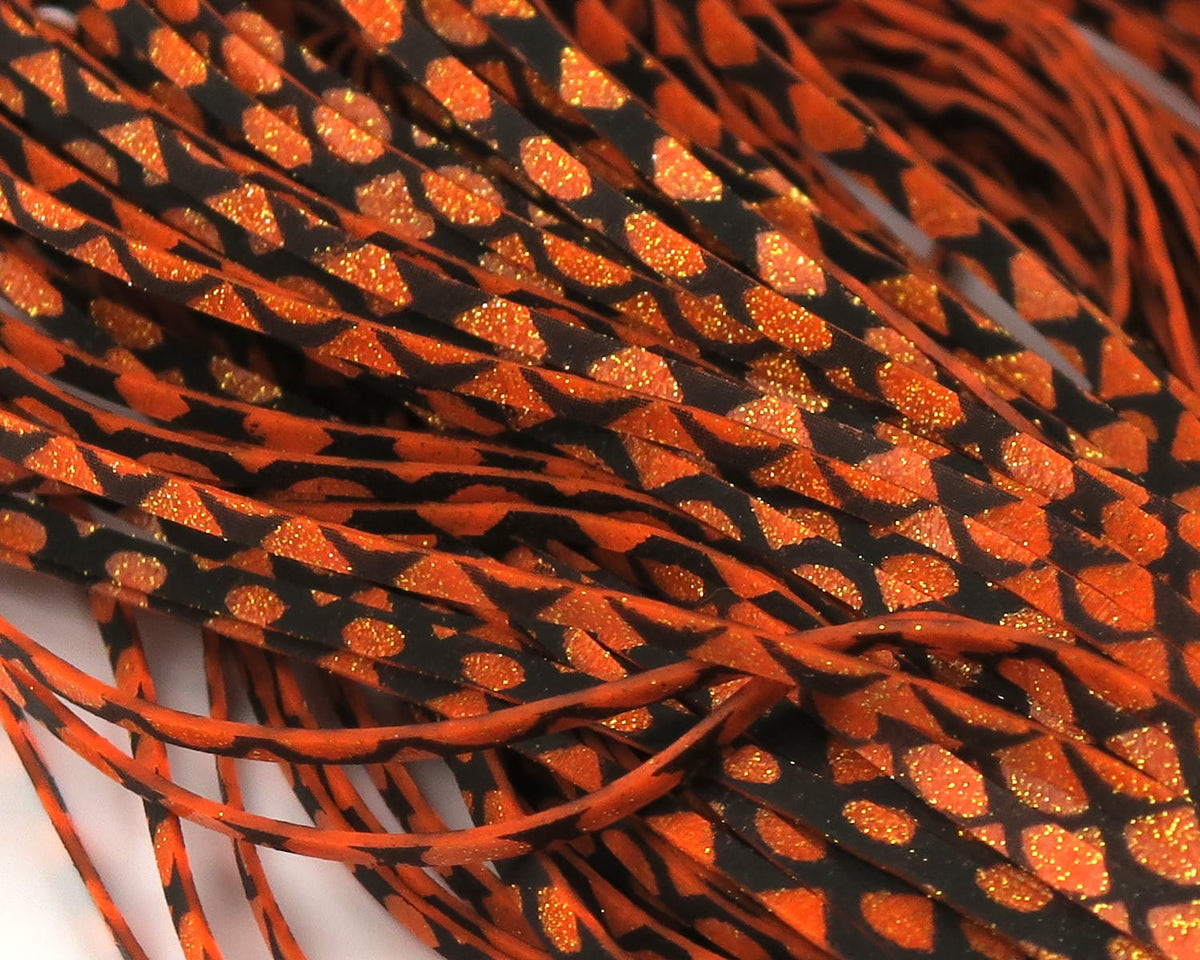 Hareline Magnum Predator Legs orange and black rubber fly-tying legs with glittery orange spotted pattern