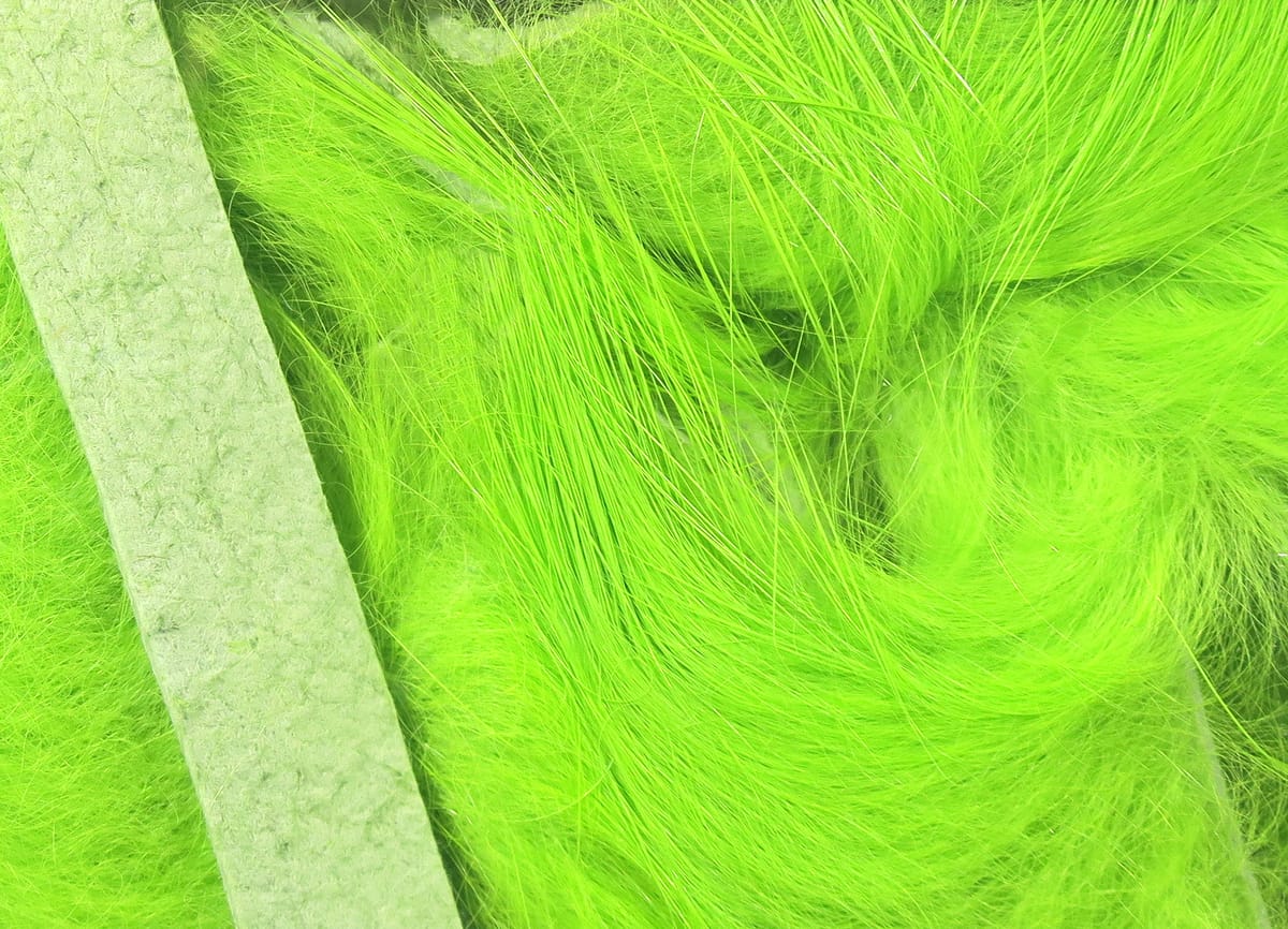 Chartreuse magnum rabbit fur strips with long soft guard hairs and suede strip backing for fly tying
