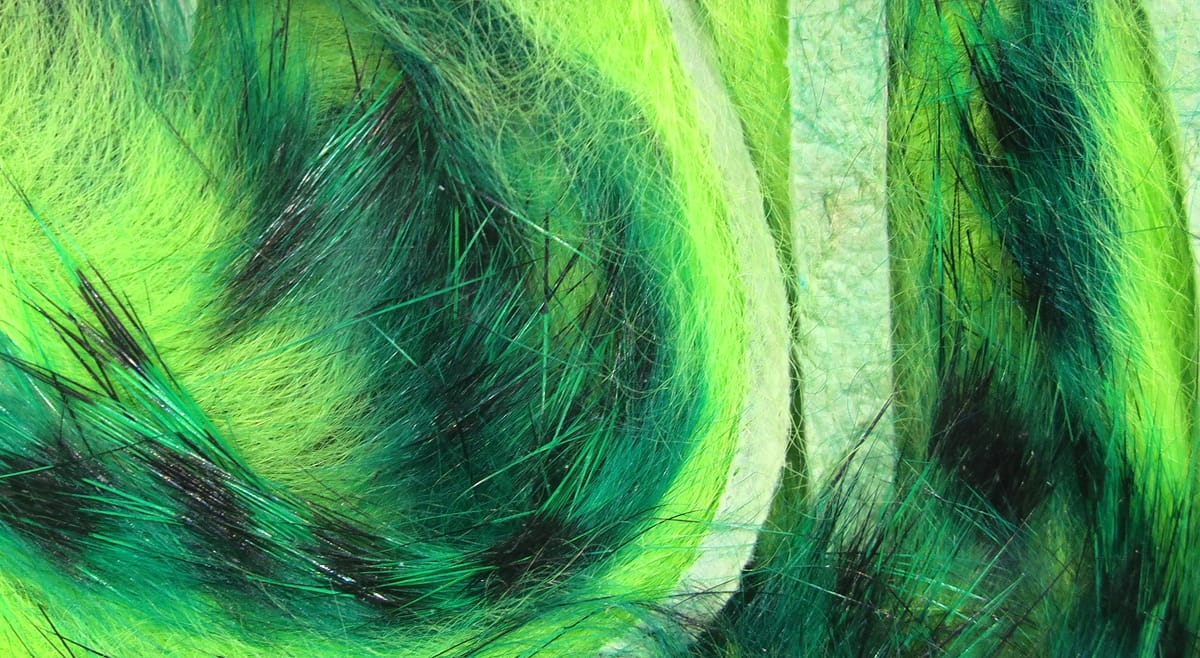Hareline Micro Pulsator strips in chartreuse and emerald green synthetic fur with iridescent flash fibers for fly tying