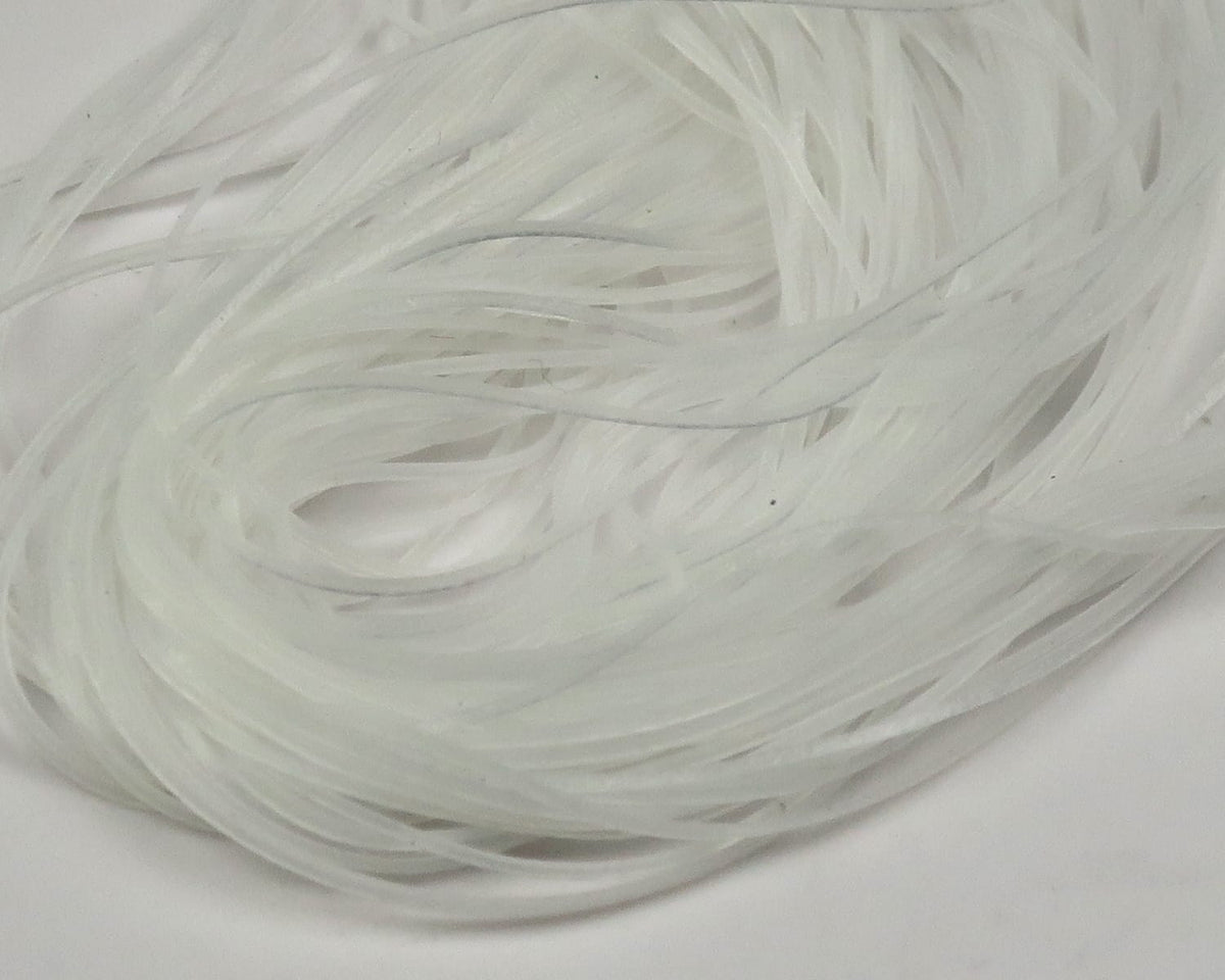 Pale white translucent micro silicone legs for fly tying, thin flexible strands with soft matte finish