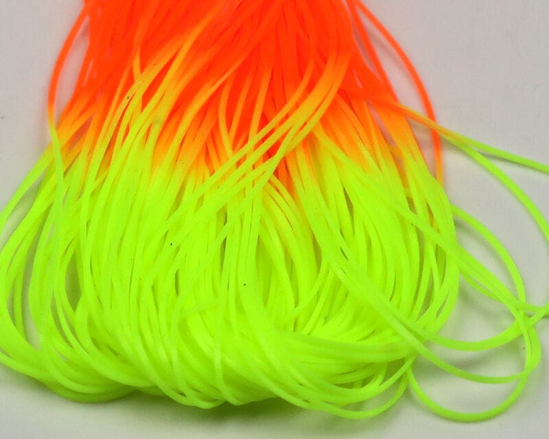 Neon orange to chartreuse Hareline micro silicone legs, thin flexible silicone strands for fly tying