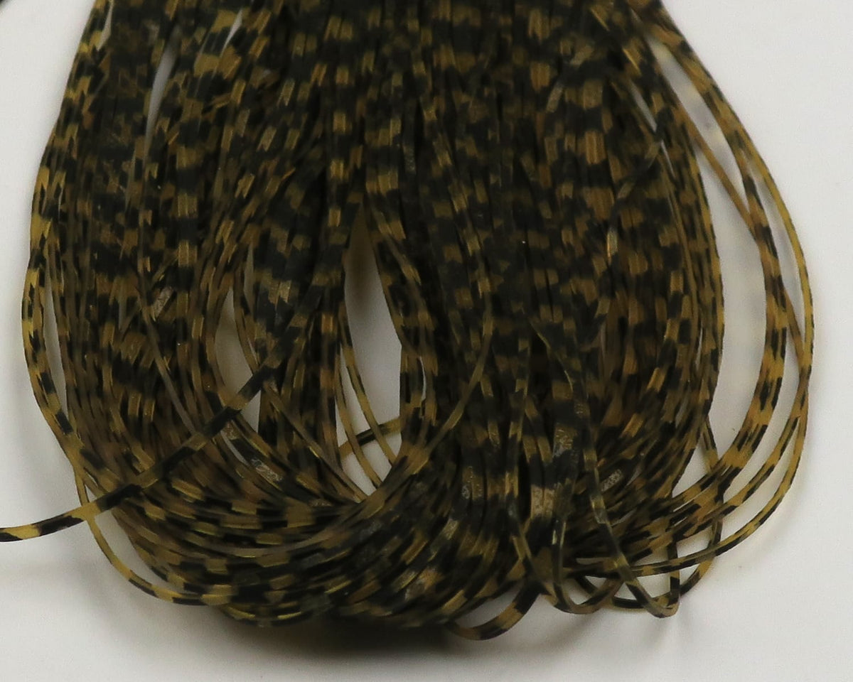 Olive and black mottled micro silicone legs for fly tying, thin flexible silicone strands coiled in a bundle