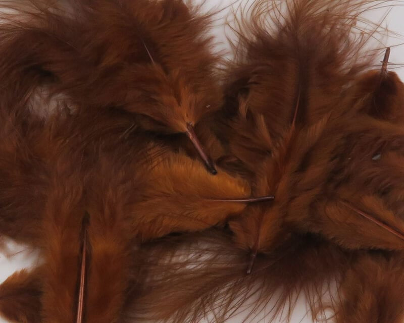 Chestnut mini marabou feathers with soft fluffy barbs and short quills, ideal for fly tying