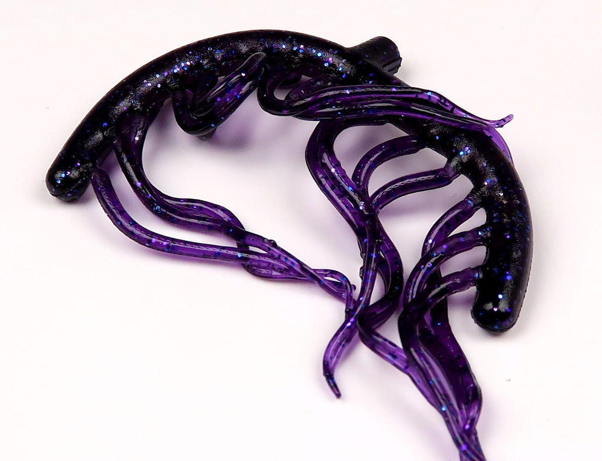 Purple and black Hareline Mini Squiggle Worms with shimmering blue glitter, soft rubber tentacles for fly tying