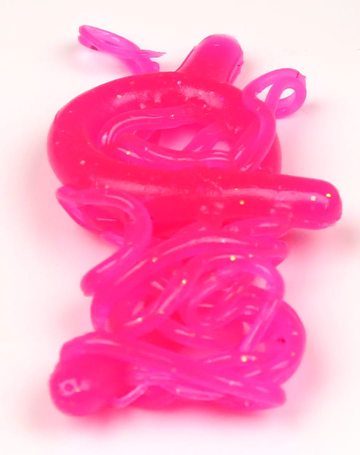 Hareline Mini Squiggle Worms, hot pink soft-plastic coiled glittery strands for fly tying and bait imitation