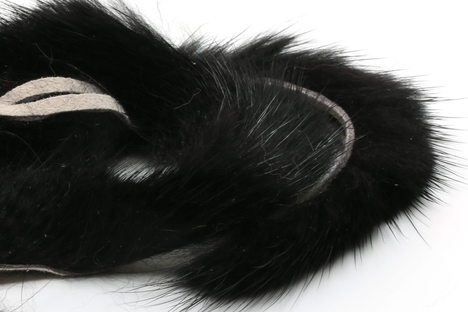 Hareline black mink strips with soft fur and suede backing, long guard hairs for fly tying