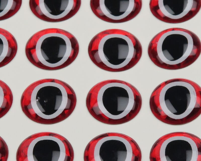 Red domed oval 3D adhesive eyes with black oval pupils and white rings on white backing, for fly tying