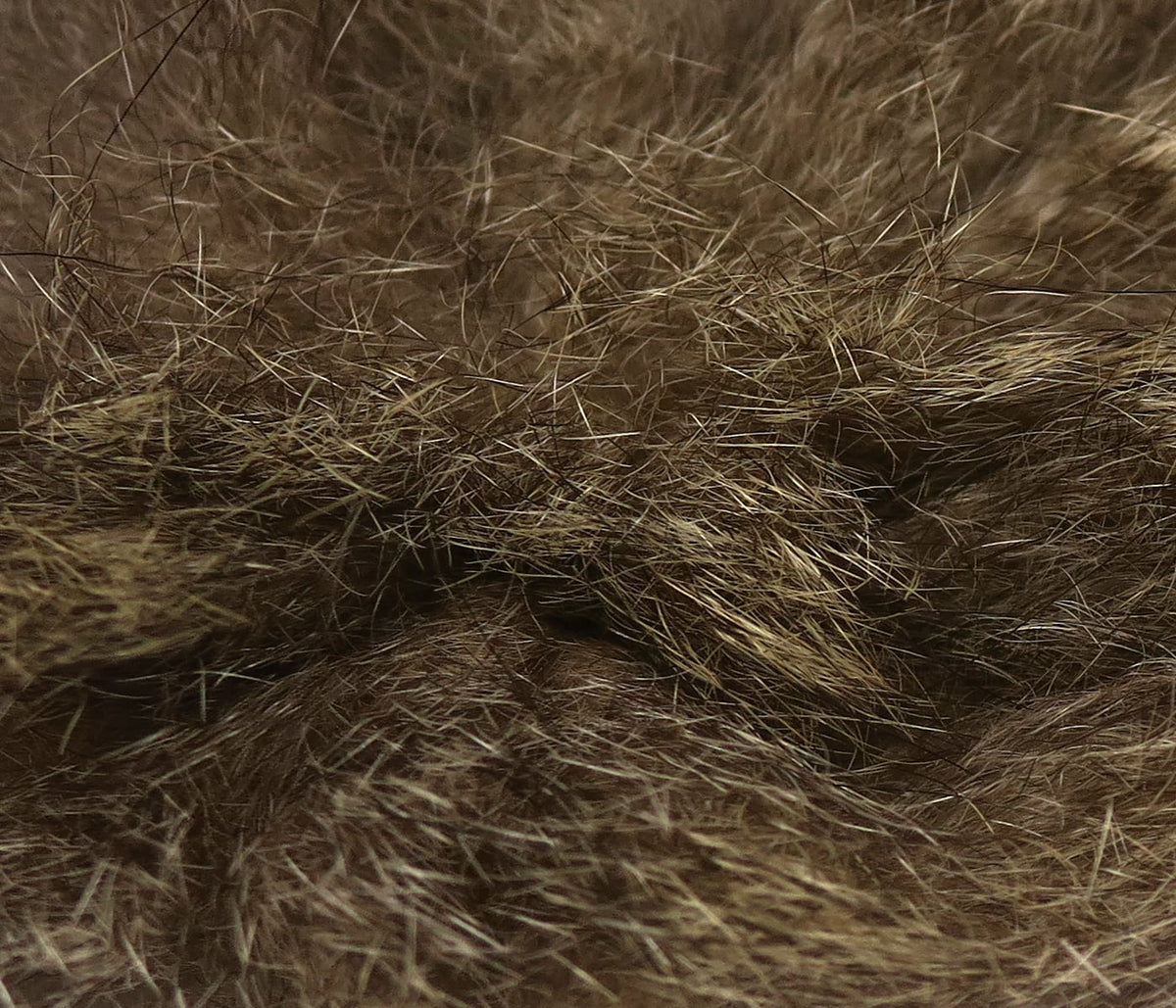 Dense mottled brown possum fur with mixed tan guard hairs and soft underfur, ideal for fly tying