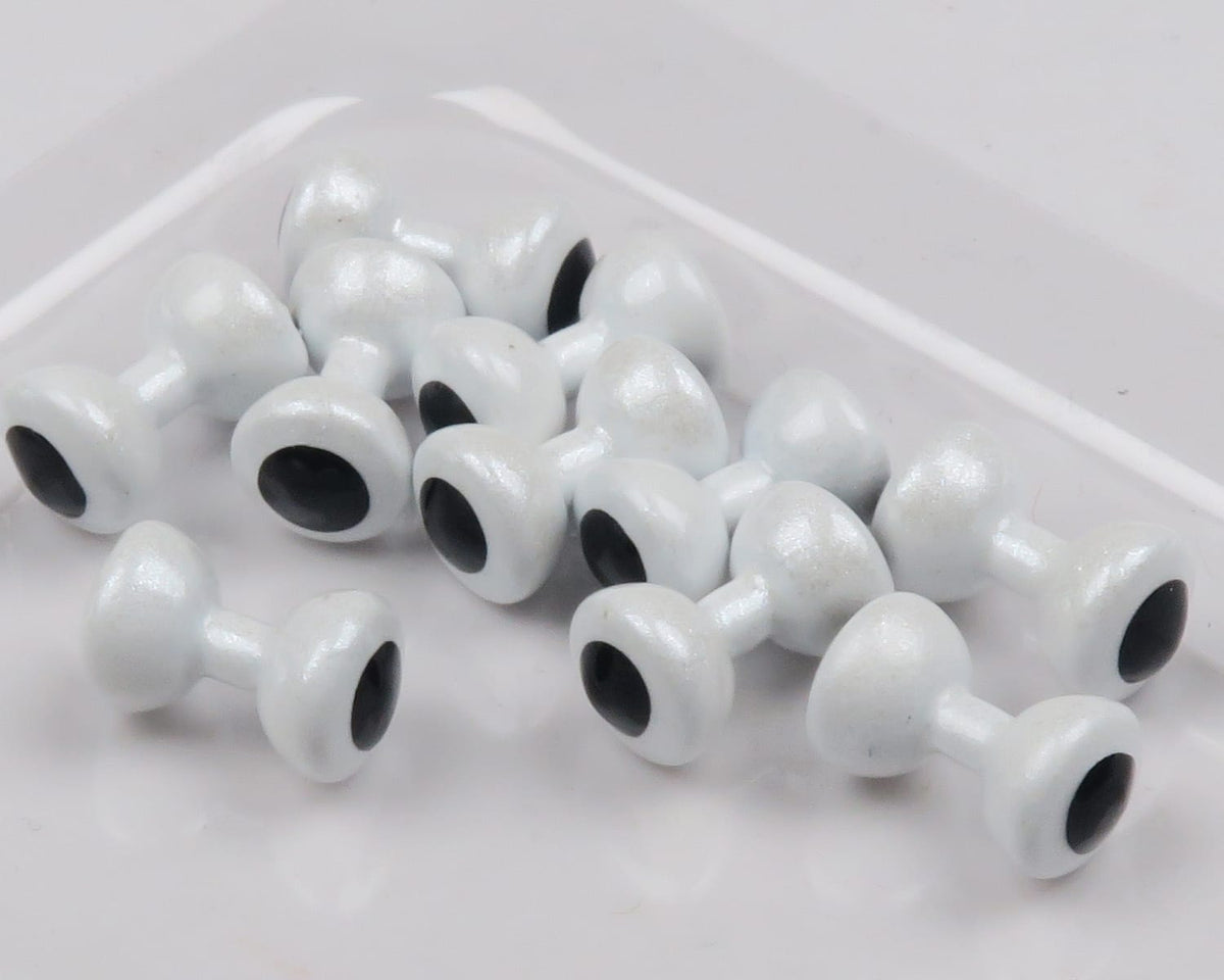 Pearlescent white painted lead eyes for fly tying with black pupils, double-barrel style in plastic tray