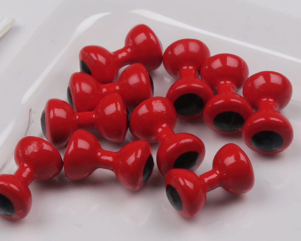 Glossy red double-lobed painted lead eyes with black hollow centers for fly tying