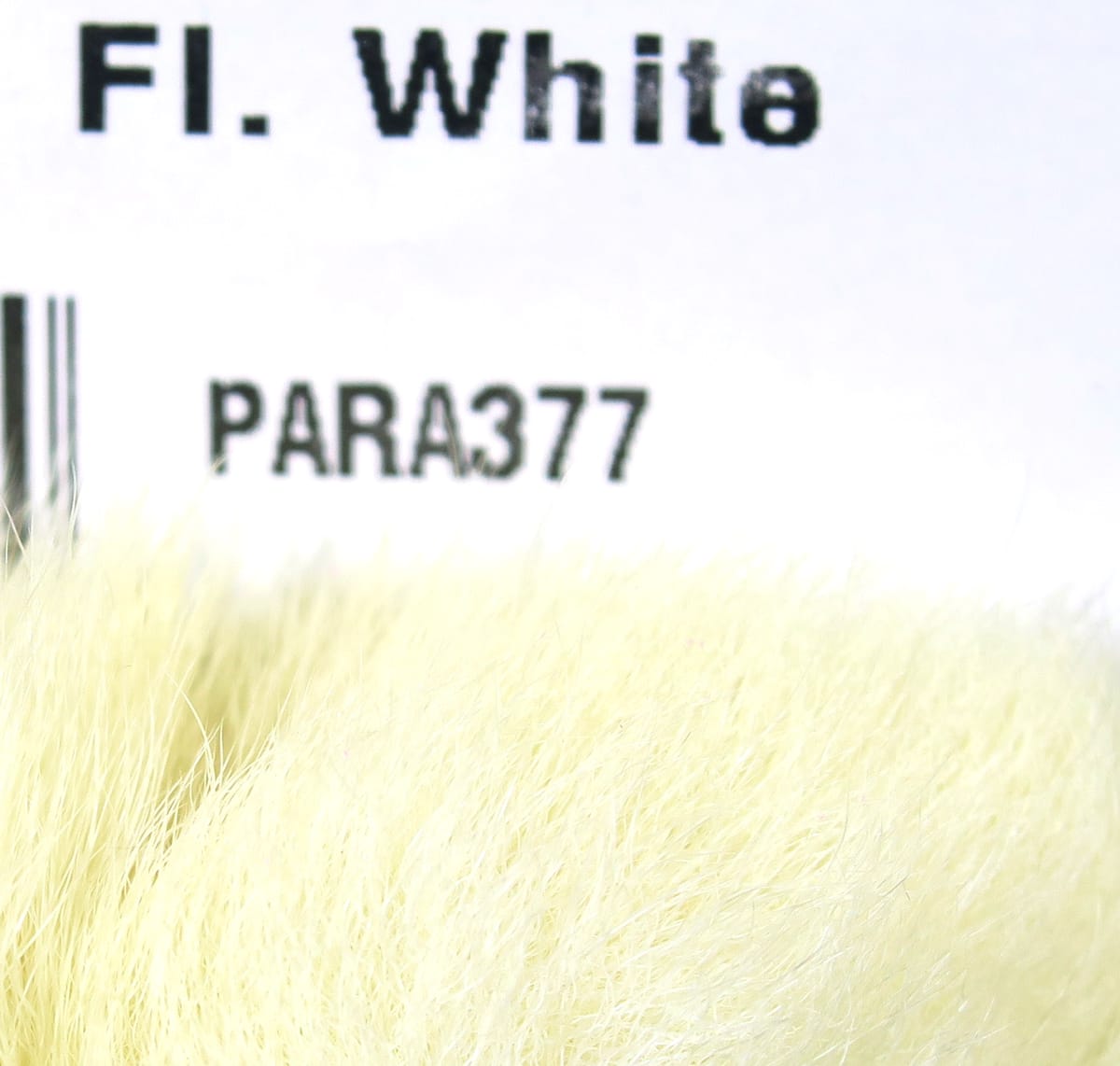 Hareline Para bunny feet fly tying material, soft fluffy off-white rabbit fur fibers labeled PARA377 Fl. White