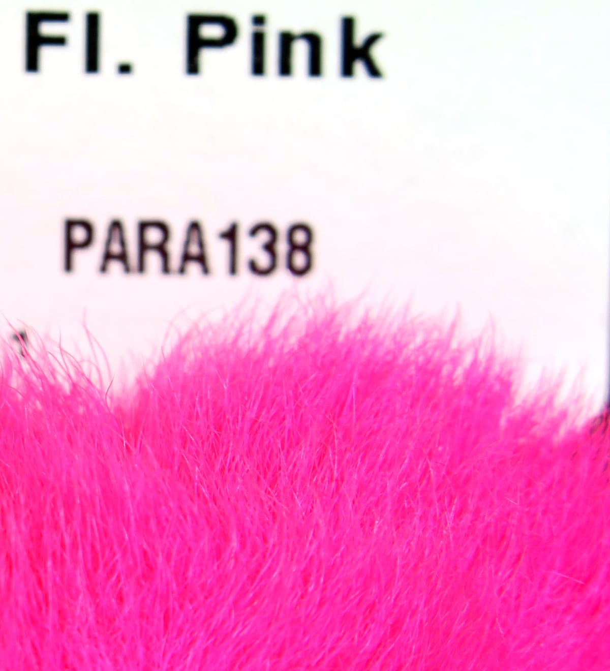 Fluorescent hot pink Hareline Para Bunny Feet fur, soft rabbit-like fibers for fly tying