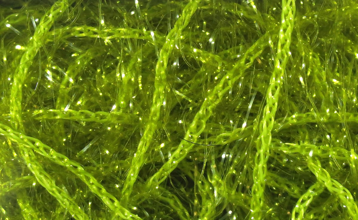 Chartreuse Hareline Polar Chenille strands with sparkling iridescent fibers for fly tying