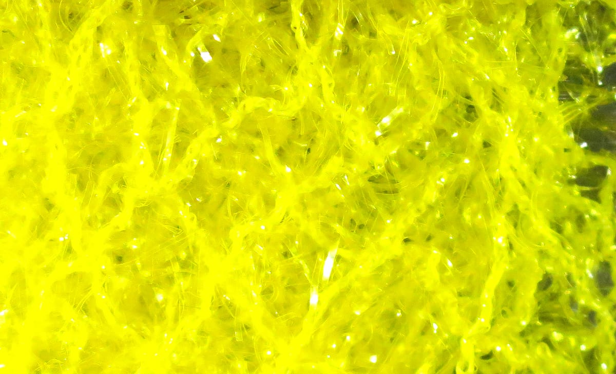 Bright chartreuse Hareline Polar Chenille with sparkling synthetic fibers, fluffy textured chenille for fly tying
