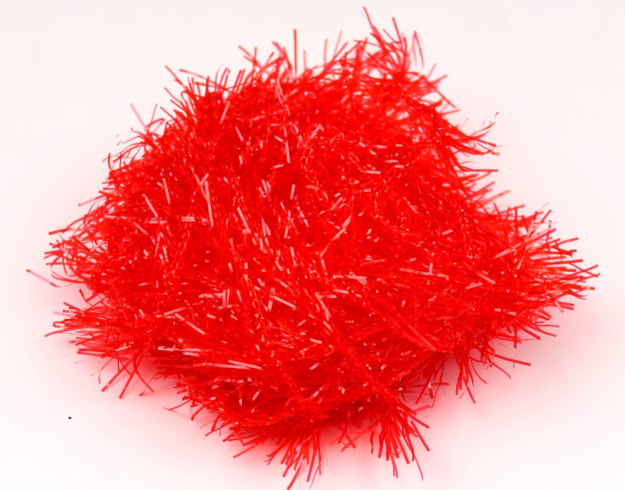 Bright red Hareline Polar Chenille tuft of shredded synthetic fibers with reflective strands for fly tying