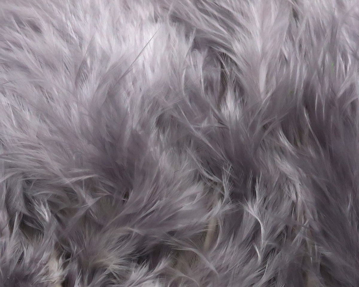 Hareline Premo turkey flats in silvery lavender, soft fluffy feathers with long barbs for fly tying