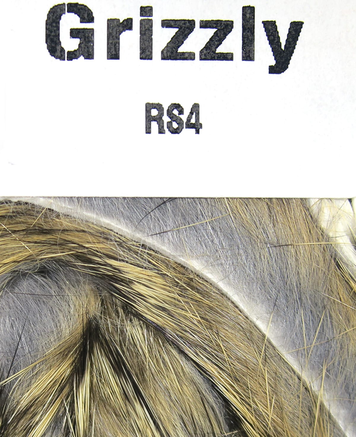 Grizzly rabbit fur strips for fly tying, gray and tan mottled fur with black guard hairs on skin strip