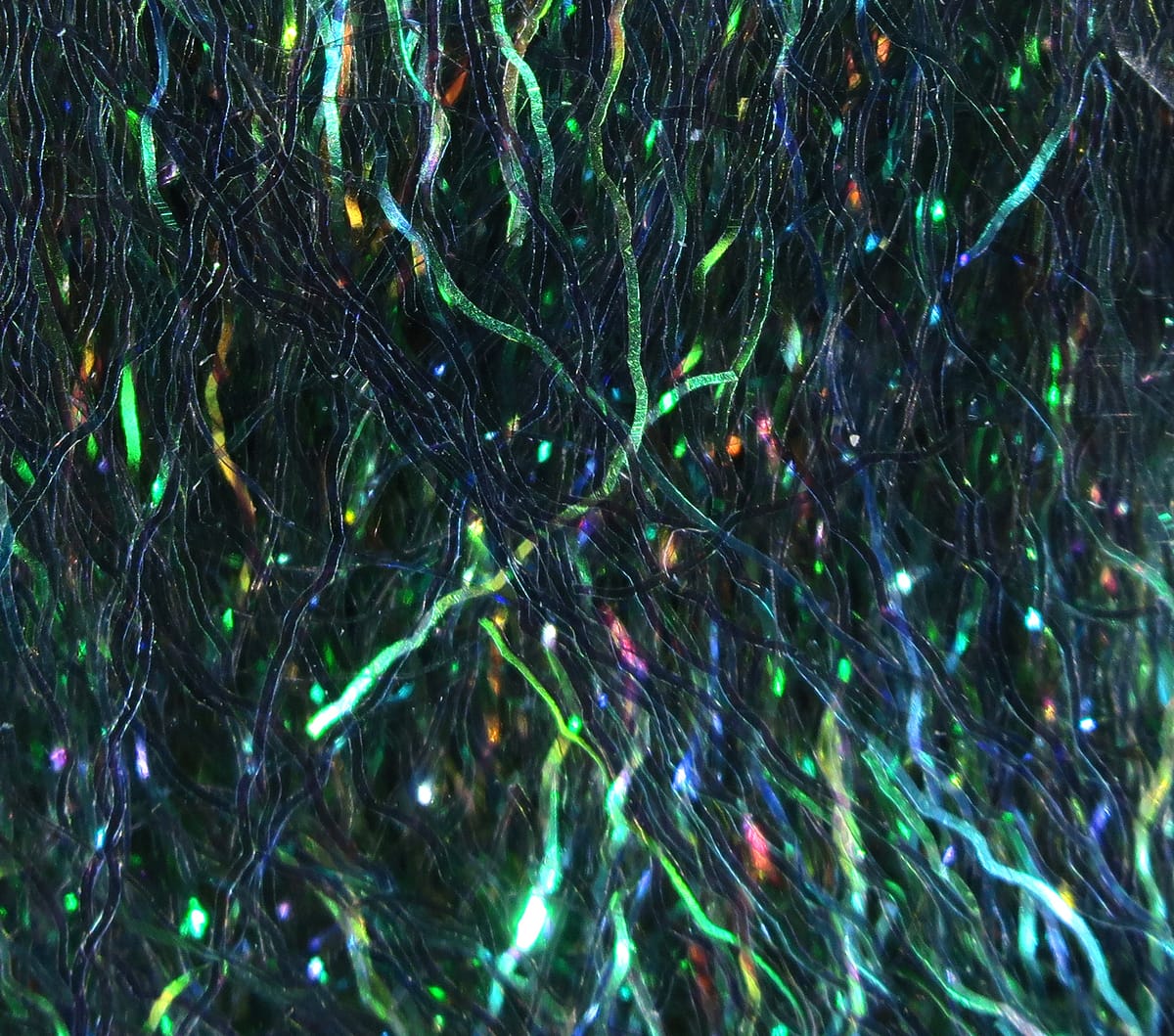 Iridescent green-blue Hareline Ripple Ice Fiber with wavy holographic synthetic strands for fly tying