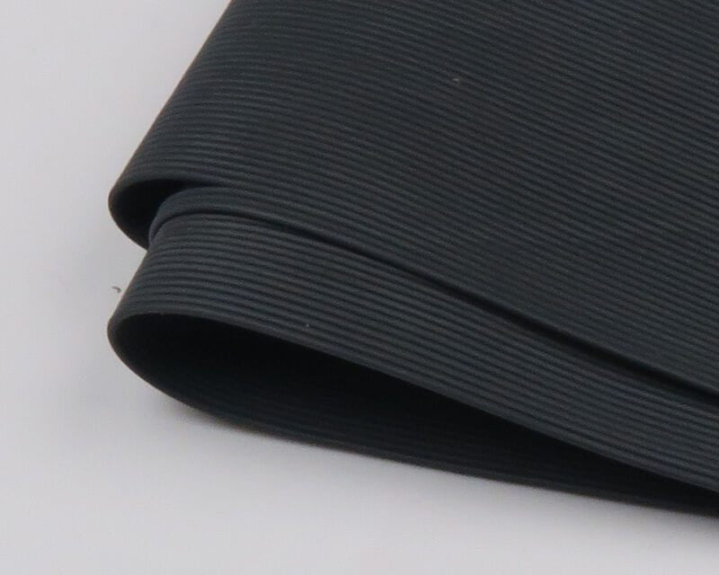 Black ribbed round rubber legs for fly tying, coiled matte rubber tubing with fine parallel ridges