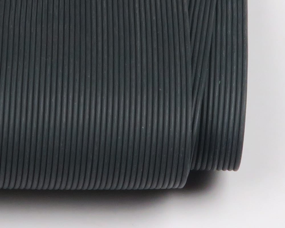 Charcoal round rubber legs wound on spool, matte rubber strands for fly tying