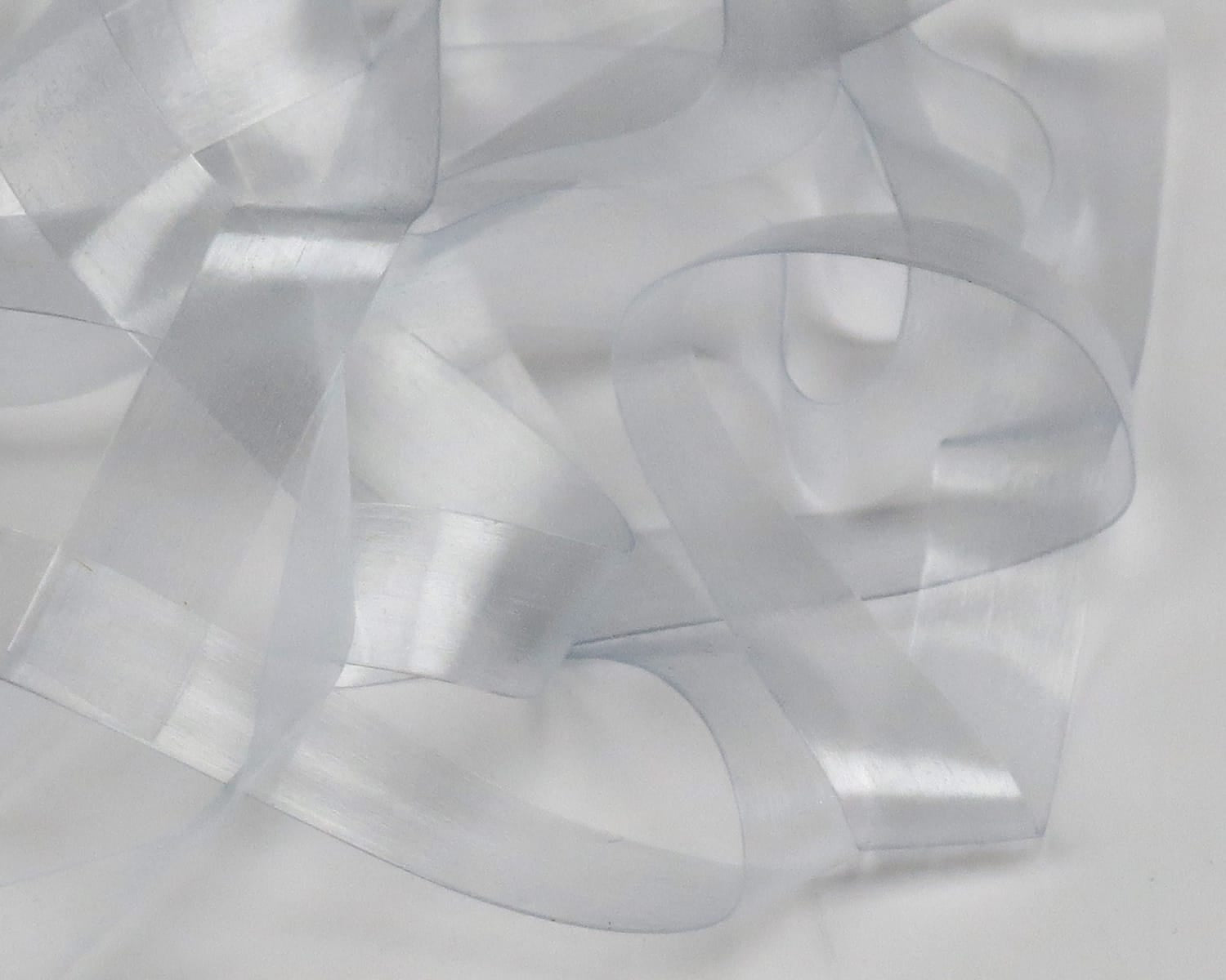 Hareline Scud Back translucent pearlescent white plastic ribbon, flexible shimmery material for fly tying