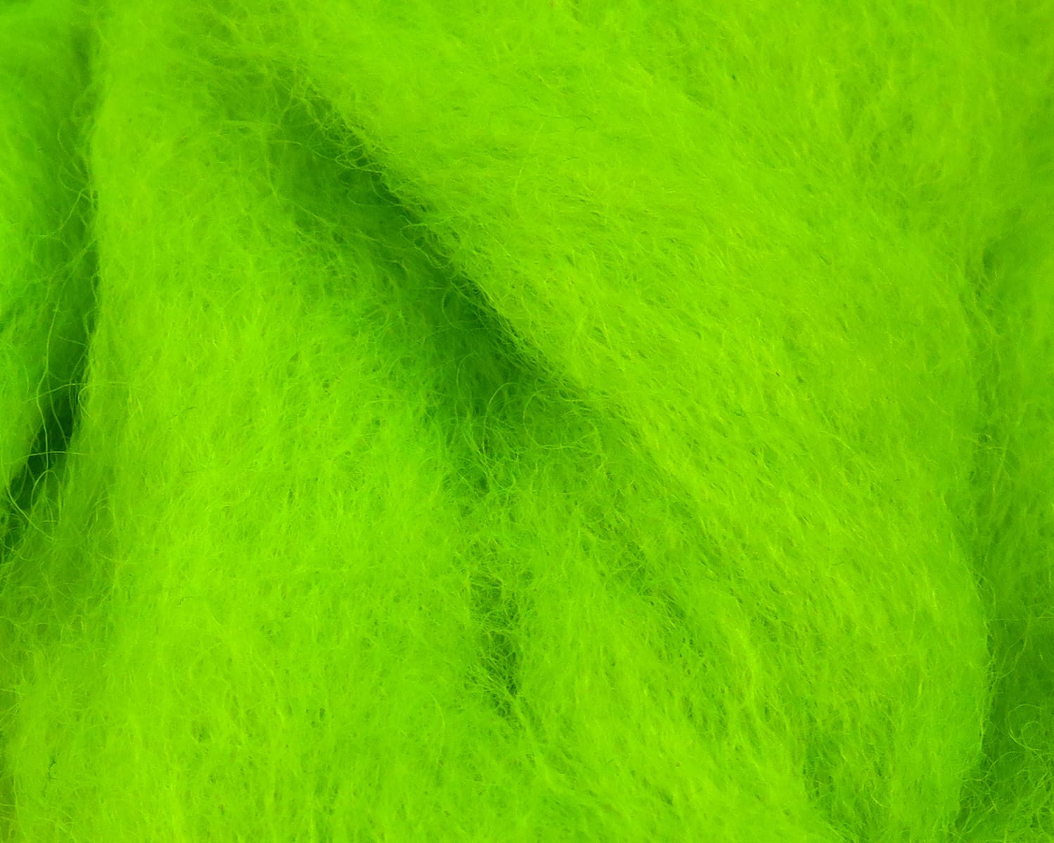 Neon chartreuse Hareline Sculpin wool, fluffy fibrous material for fly tying with soft fuzzy texture