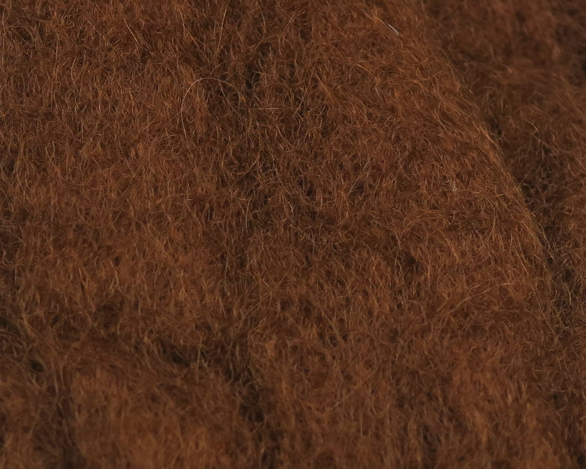 Hareline Sculpin Wool in rich brown, fuzzy natural fibers with dense, hairy texture for fly tying