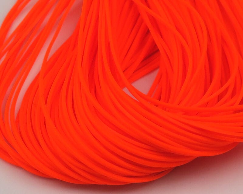 Fluorescent orange silicone flutter legs, bundled slender rubber strands for fly tying and streamer flies