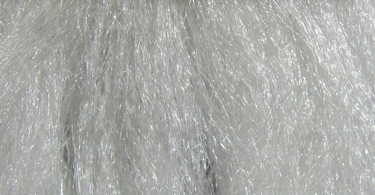 Fine white-silver sparkle emerger yarn with shiny synthetic fibers for fly tying
