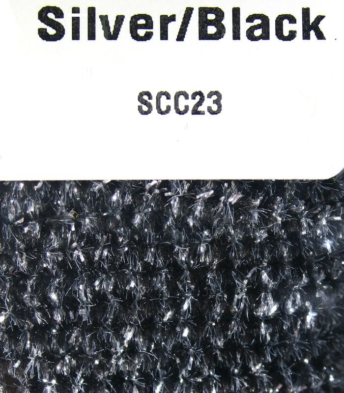 Silver and black speckled chenille for fly tying, close-up showing metallic flashes and dense fuzzy texture