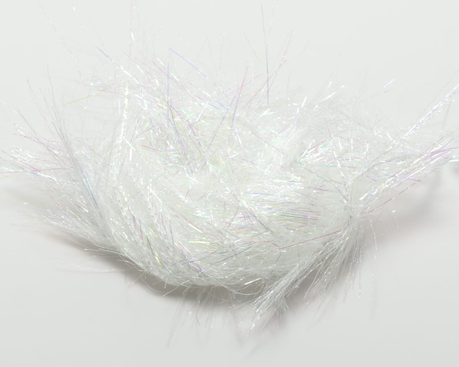 Iridescent white Hareline Spectrum Glimmer chenille bundle with fluffy, tinsel-like synthetic fibers for fly tying