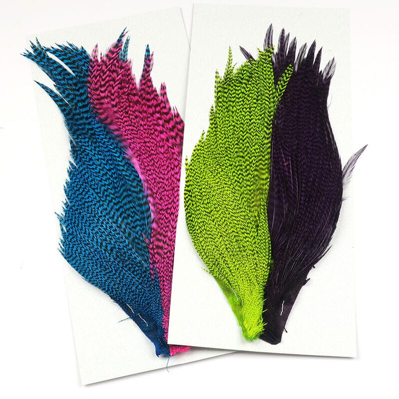 Hareline starter cape set of dyed grizzly hackle feathers in blue, magenta, chartreuse and purple for fly tying