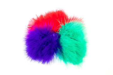 Bright red, purple and teal marabou feather quills clustered into fluffy plumes for fly tying
