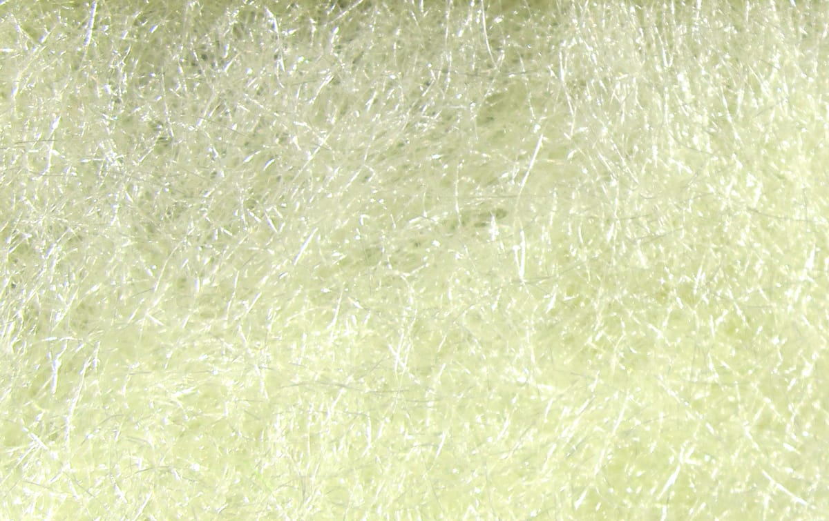 Pale chartreuse synthetic trilobal dubbing fibers with pearlescent sheen for fly tying