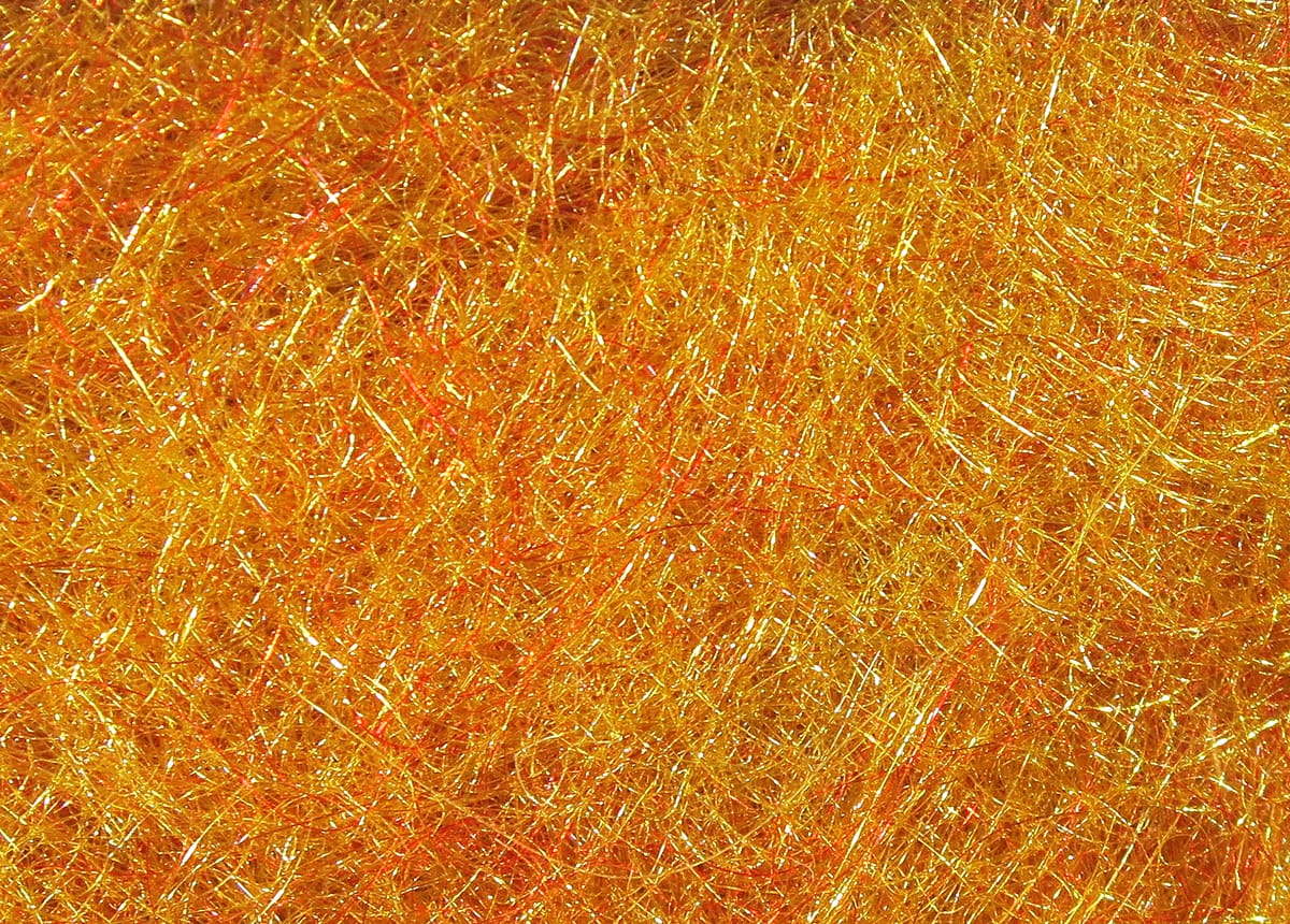 Hareline STS trilobal golden orange synthetic dubbing fibers with iridescent flash for fly tying
