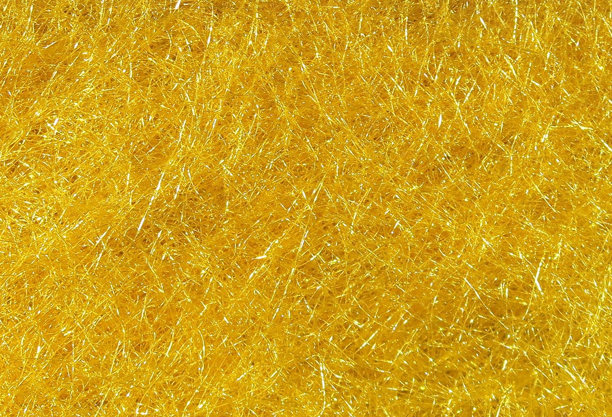 Golden yellow Hareline STS trilobal dubbing fibers, fine sparkly synthetic strands for fly tying