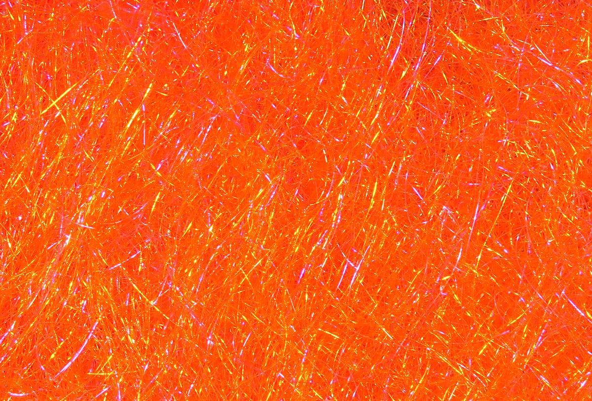 Bright orange Hareline STS trilobal dubbing fibers with iridescent flash for fly tying