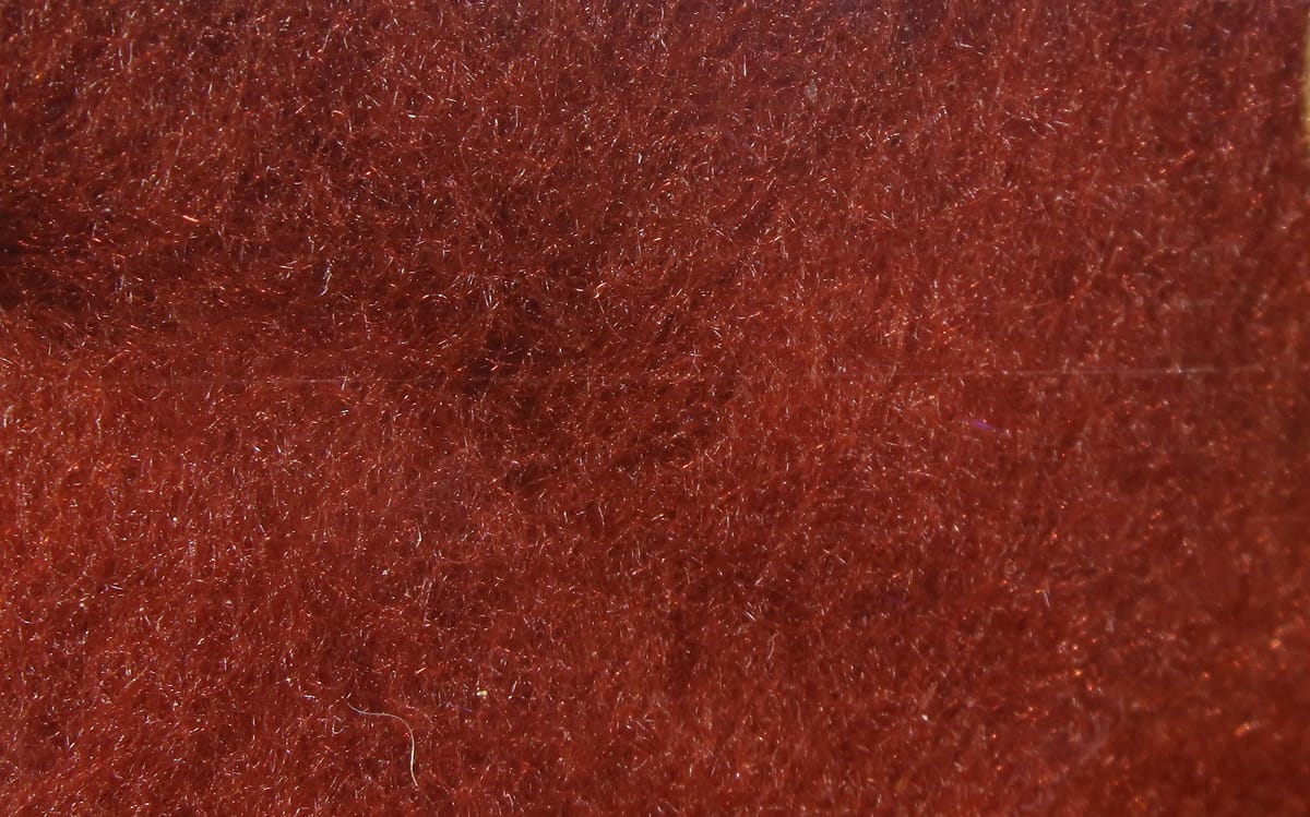 Rusty brown Hareline super fine dry fly dubbing, dense synthetic fibers with subtle copper flash for fly tying