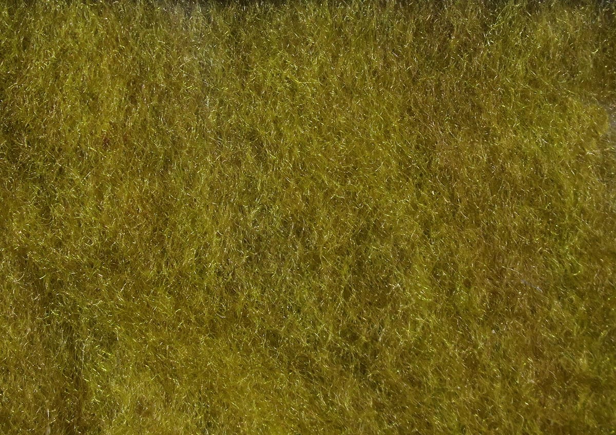 Olive green Hareline super fine dry fly dubbing, soft fuzzy synthetic fibers with subtle iridescent flash for fly tying