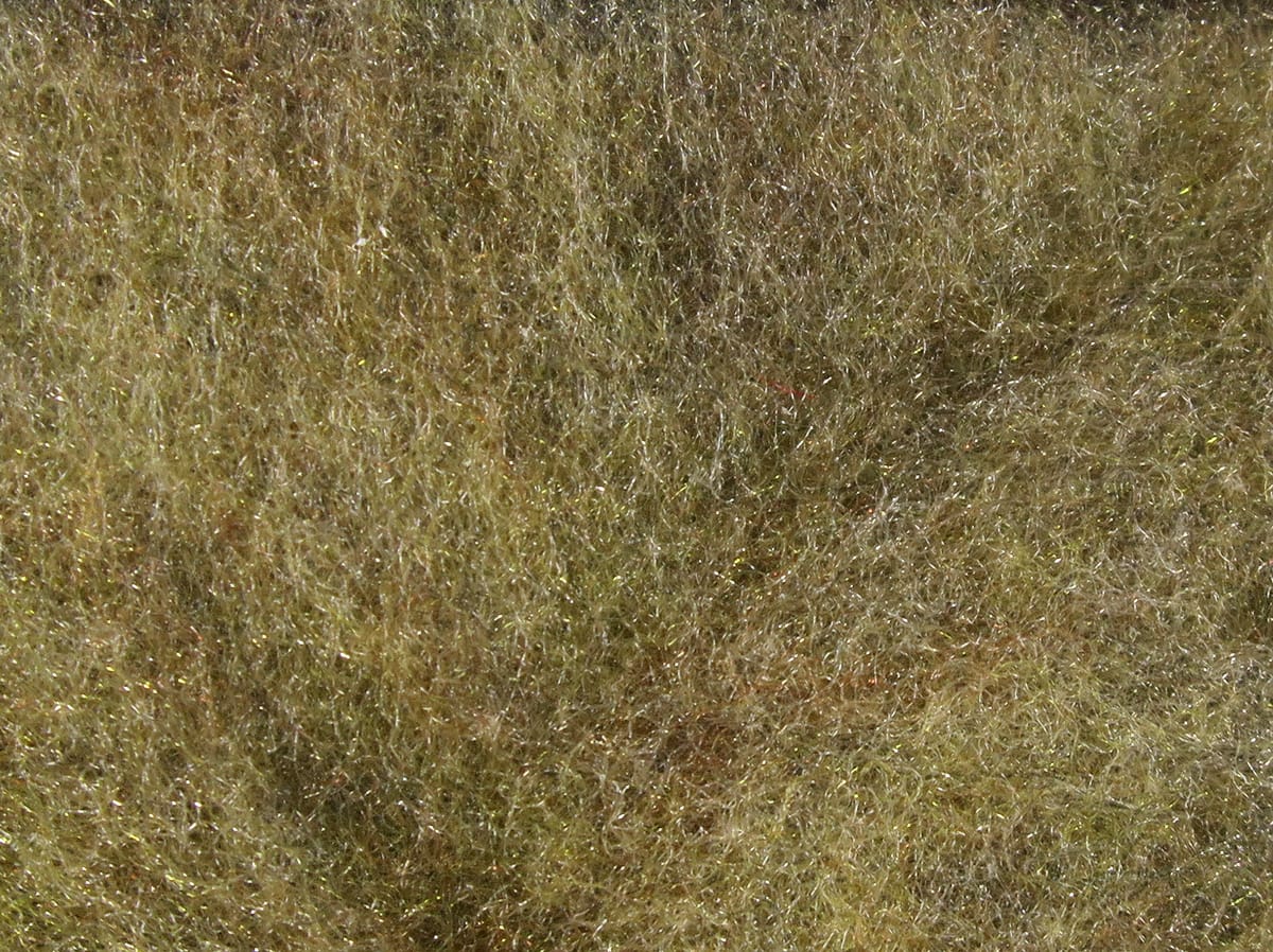 Olive green super fine dry fly dubbing with dense, fur-like fibers and subtle gold flash for fly tying