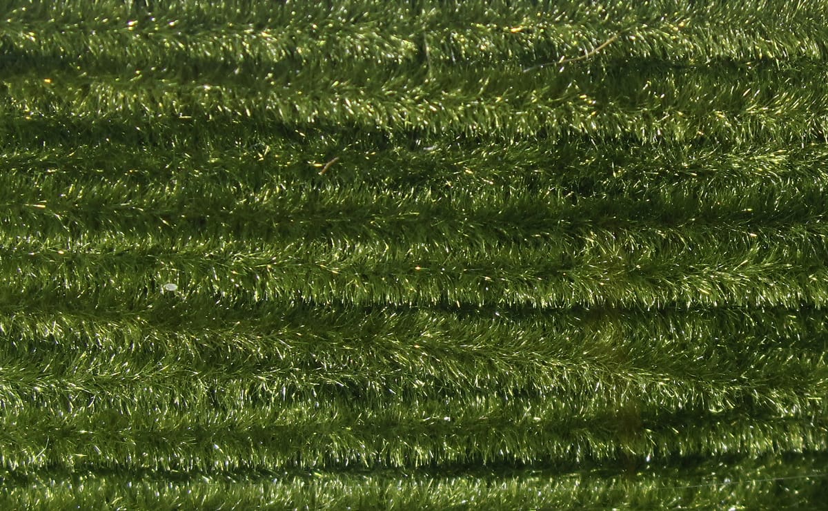 Olive green ultra chenille with dense fuzzy fibers and subtle sparkle for fly tying