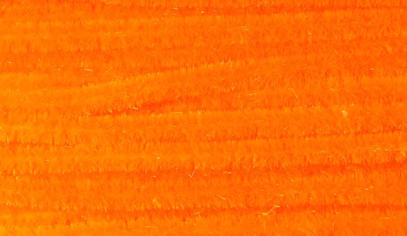 Hareline Ultra Chenille in vivid orange, fuzzy synthetic yarn with subtle iridescent flash, ribbed strands for fly tying