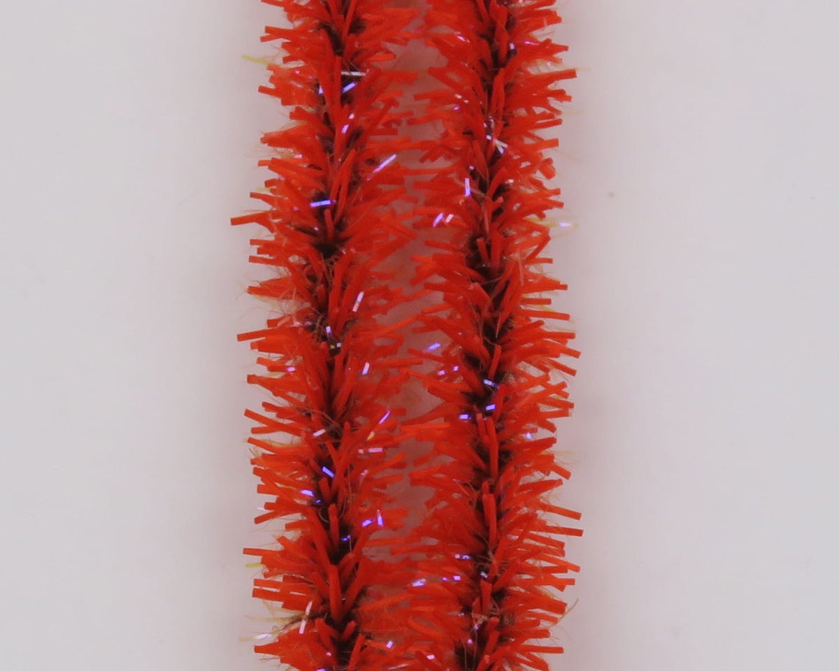Two red Hareline Flexi Squishenille chenille strands with UV iridescent tinsel, fuzzy fringe for fly tying