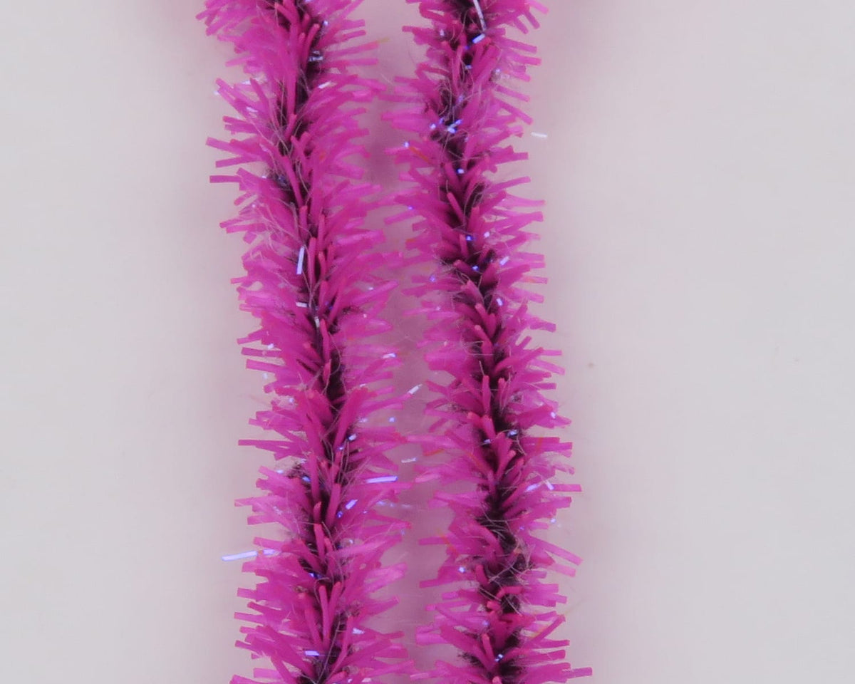 Two hot pink UV Flexi Squishenille chenille strands with black core and iridescent tinsel fibers for fly tying