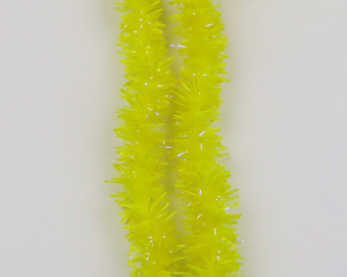 Fluorescent yellow UV Flexi Squishenille chenille with spiky synthetic fibers and iridescent tinsel for fly tying