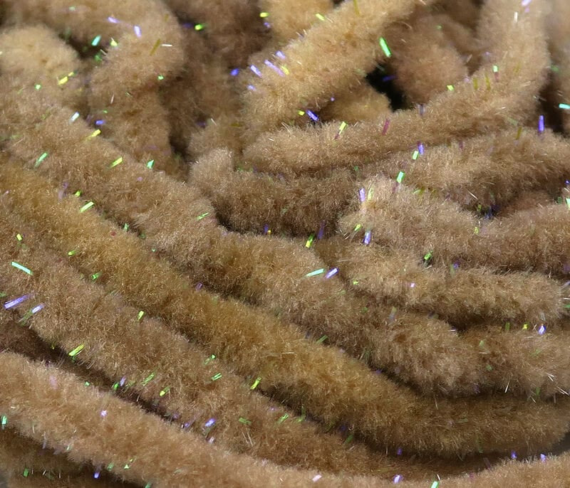 Hareline UV Galaxy mop chenille in tan, fuzzy chenille strands with scattered iridescent UV tinsel for fly tying