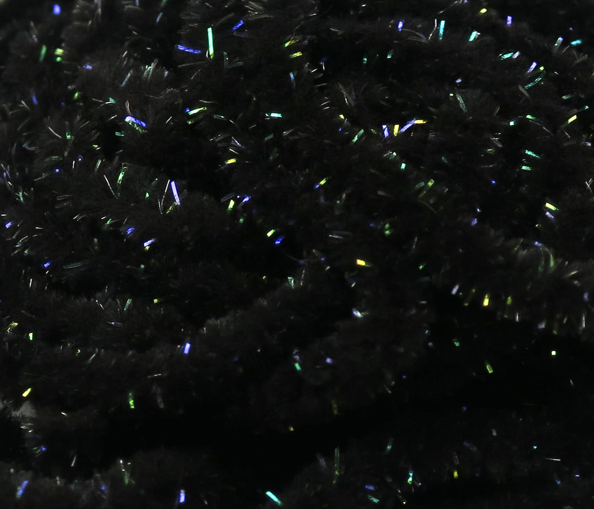 Black Hareline UV Galaxy mop chenille with dense fluffy black fibers and iridescent green-blue sparkle for fly tying