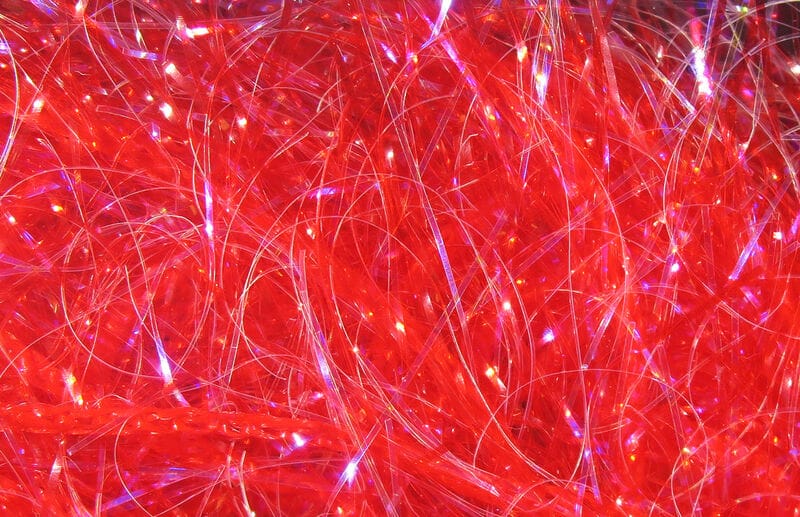Bright red Hareline UV polar chenille with iridescent synthetic fibers and sparkling strand texture for fly tying